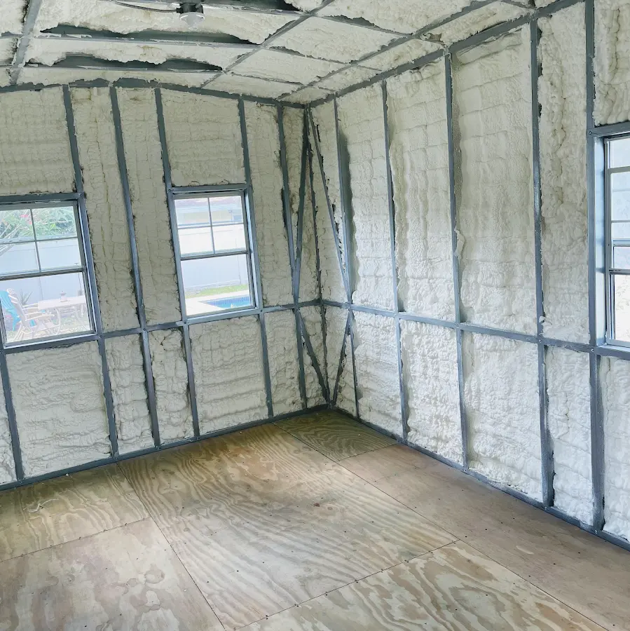 Closed-cell spray foam insulation applied to wall cavities in a residential project in Othello